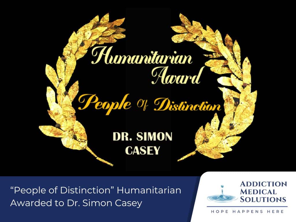 People of distinction humanitarian awarded to dr simon casey